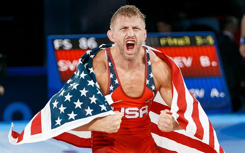 Kyle Dake with USA flag after winning 2021 World title