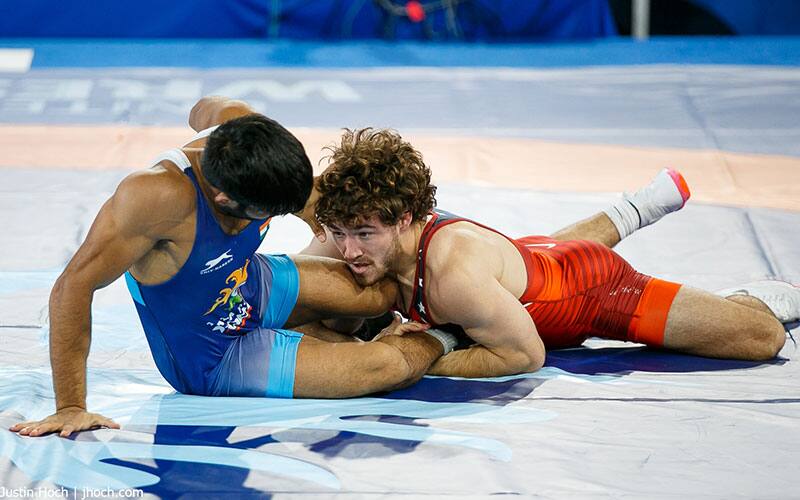 Daton Fix scores a takedown at the 2021 World Championships