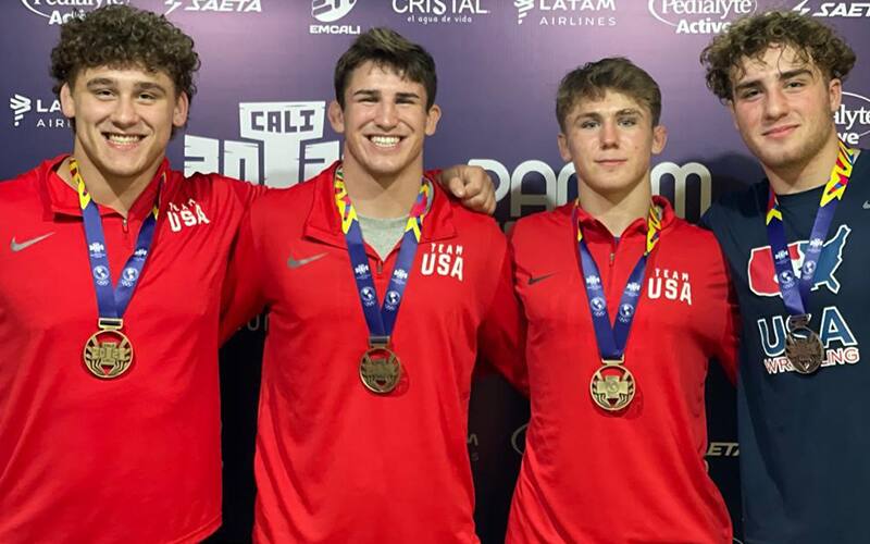 Men's freestyle medalists from the 2021 Pan American Games pose with their medals