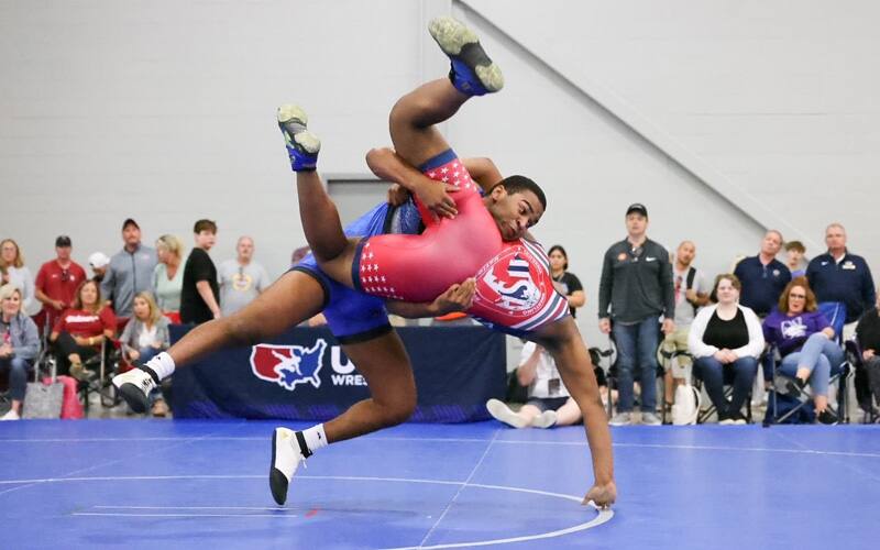 Bradley Moore (CA) and Emmanuel Skillings (OK) battle at 220 pounds at Junior National Freestyle Duals