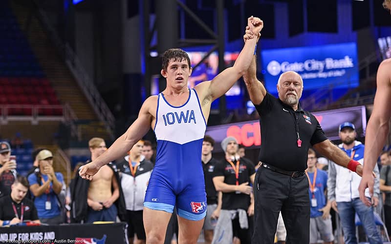 Wyatt Voelker of Iowa gets his hand raised in the Nationals semifinals