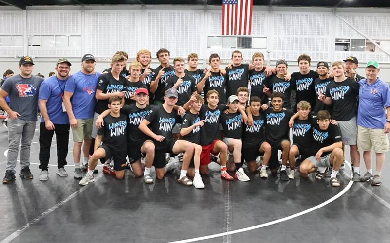 Iowa poses with the trophy after winning Junior National Freestyle Duals