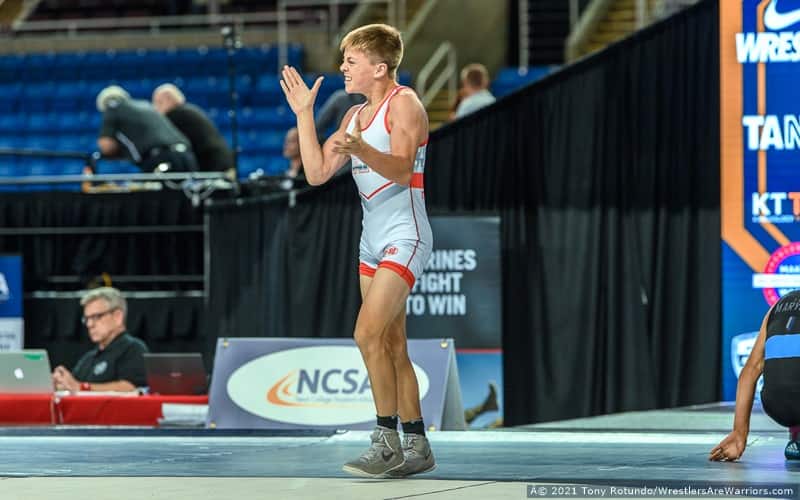 Mack Mauger of Idaho claps his hands after a win at the 16U Freestyle Nationals