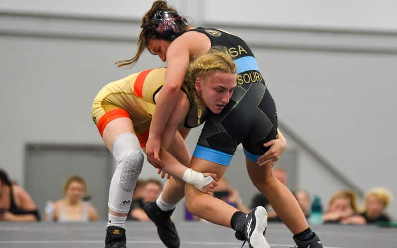 Mia Palumbo of Illinois scores a takedown at National Junior Duals