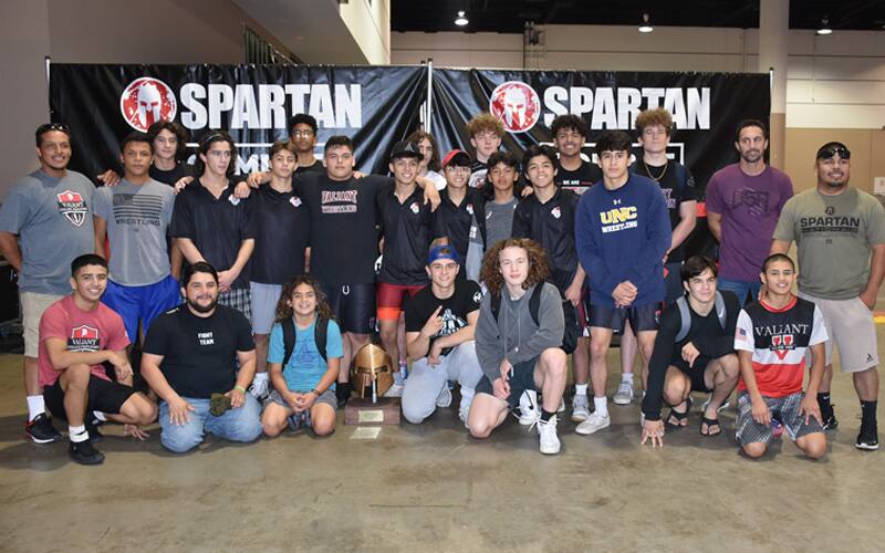 Valiant Prep Greco-Roman team poses with its trophy after winning Spartan Nationals Greco-Roman Duals