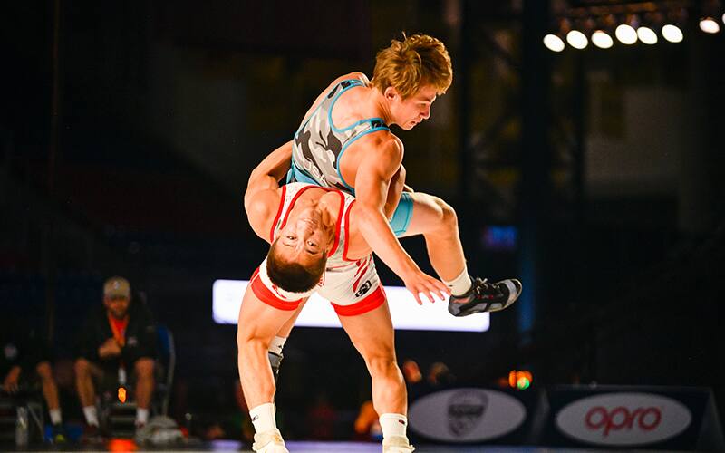 Joel Adams throws his opponent in a back arch for five points in the finals. 