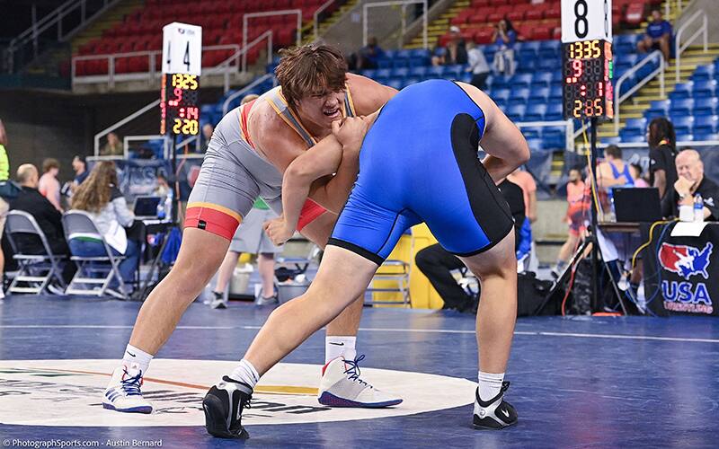 Schunke snaps and circles for control with an underhook.