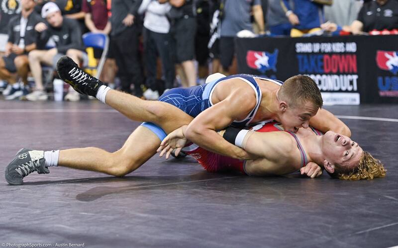Sergio Lemley of Indiana goes for a pin at Junior Nationals