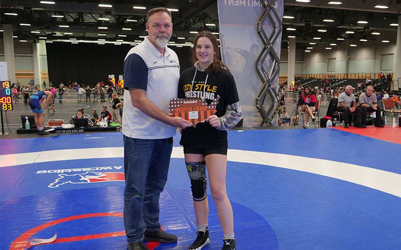 Sydney Perry (IL) receives Outstanding Wrestler Award at Brian Keck Preseason Nationals from Rob Cate