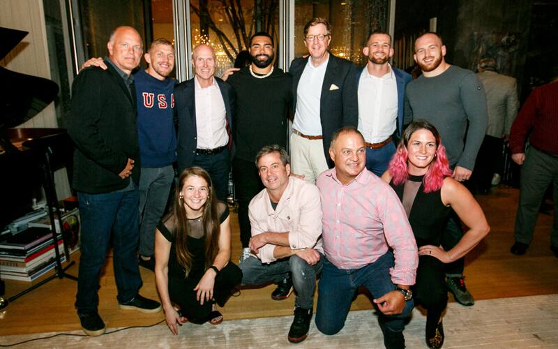 Six 2020 Olympic medalists pose with the Living the Dream Medal Fund stewards during ceremony in New York City