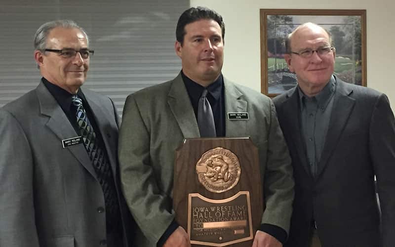 Marv Reiland, Mark Reiland and Dan Gable at the Iowa Wrestling Hall of Fame induction