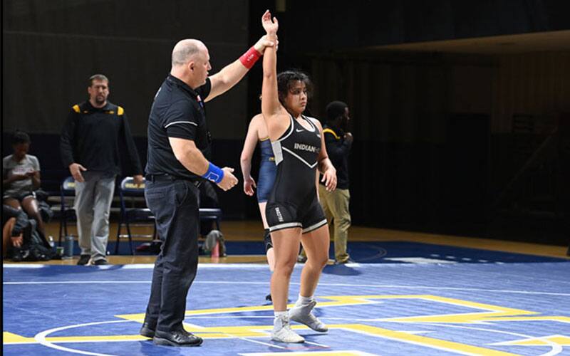 Indian Hills CC women's wrestler gets her arm raised in victory