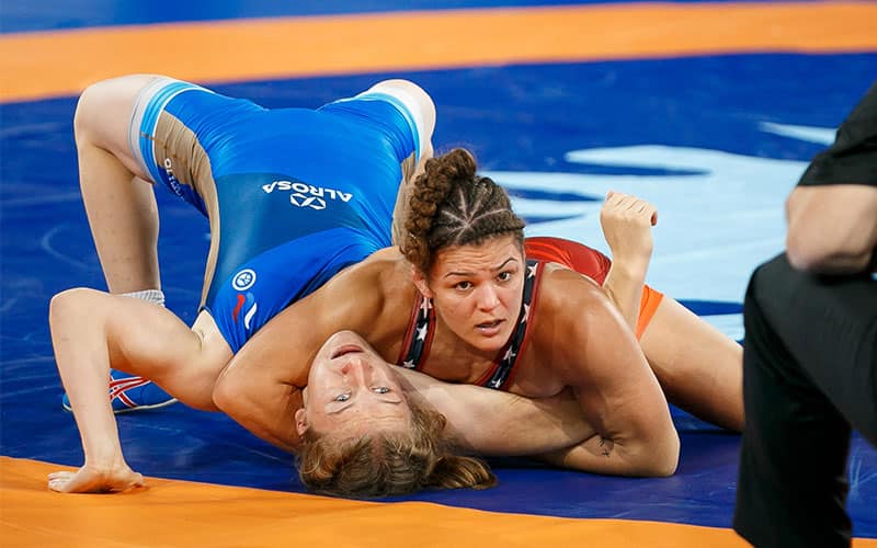 Kayla Miracle (USA) presses Alina Kasabieva (Russia) on her back.