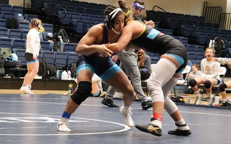 Action image of King University women's wrestling