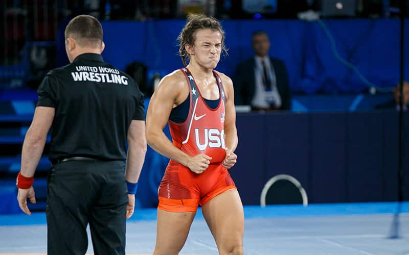 Forrest Molinari (USA) shows the USA on her singlet after Worlds quarterfinals victory over Koumba Larrouque (France)