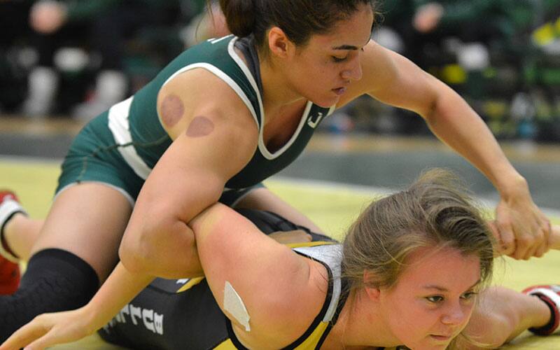 Sugey Ceja of Tiffin University runs an arm bar