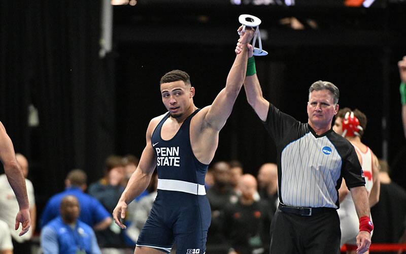 Aaron Brooks (Penn State) with his arm raised in victory. Photo by Sam Janicki
