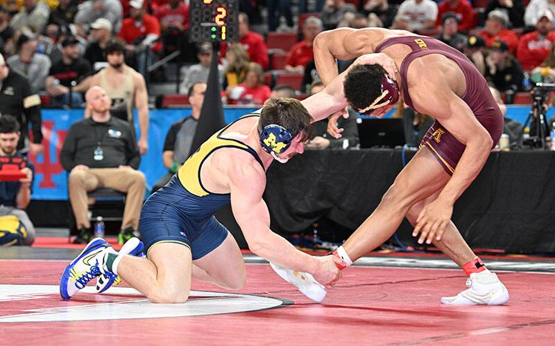 Patrick Brucki (Michigan) hits ankle pick on Michial Foy (Minnesota) at 2022 Big Ten Championships.
