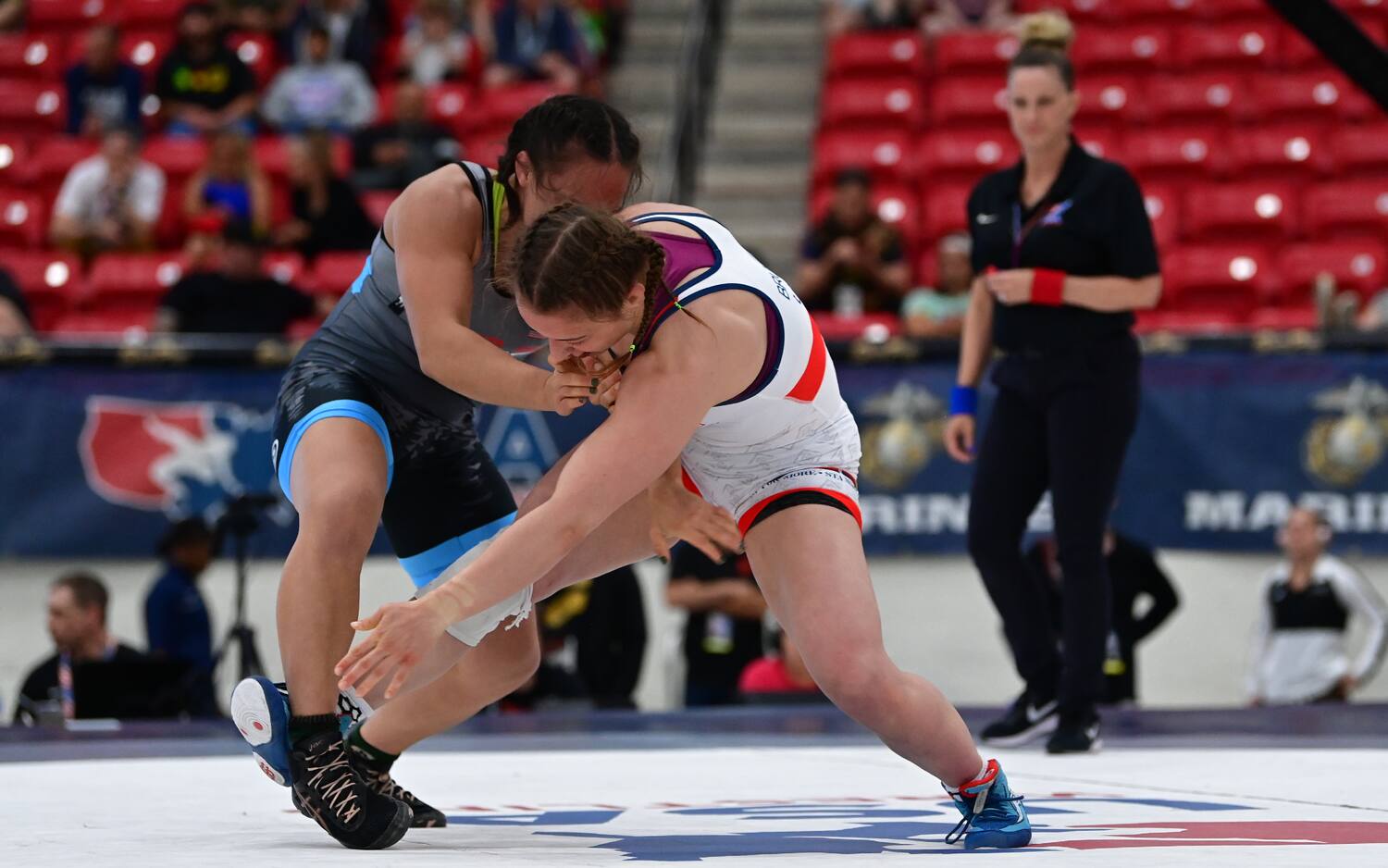 Emma Bruntil attacks Mallory Velte with a cross ankle pick in the finals of the US Open