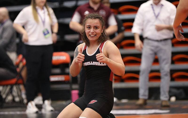 Leilah Castro (Campbellsville) is thumbs up after winning NAIA Nationals semifinals bout at 123
