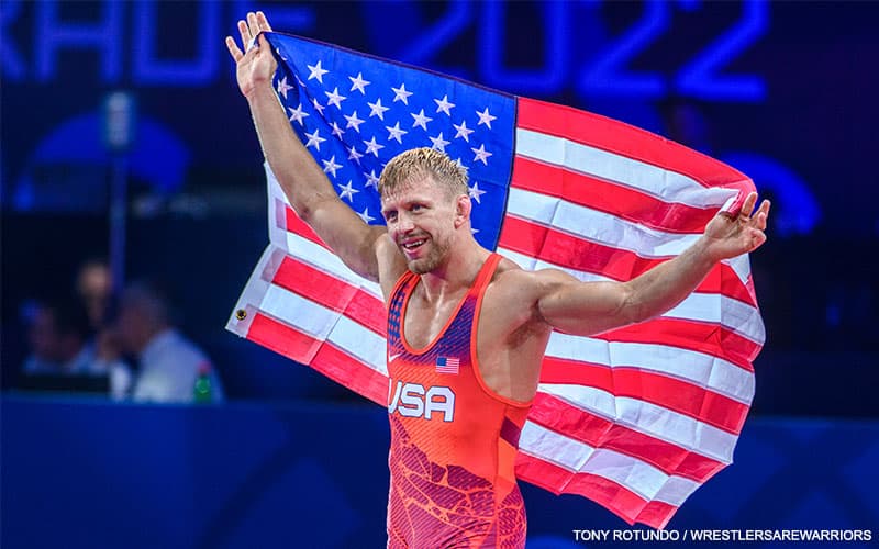 Kyle Dake with the U.S. flag after winning 2022 World title