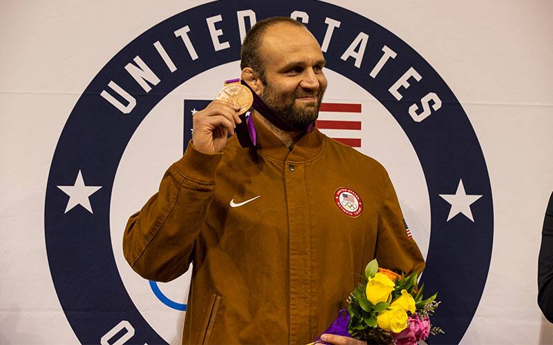Tervel Dlagnev (Team USA) with his 2012 Olympic bronze medal at 120 kg during Olympic Medal Reallocation Ceremony in Lincoln, Neb.