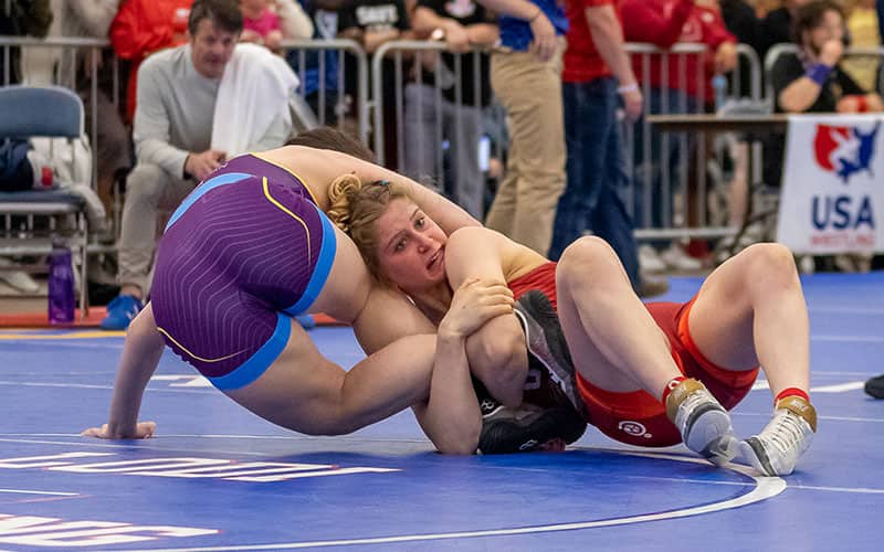 Amit Elor (CA) works an ankle lace at the 2022 U20 Nationals