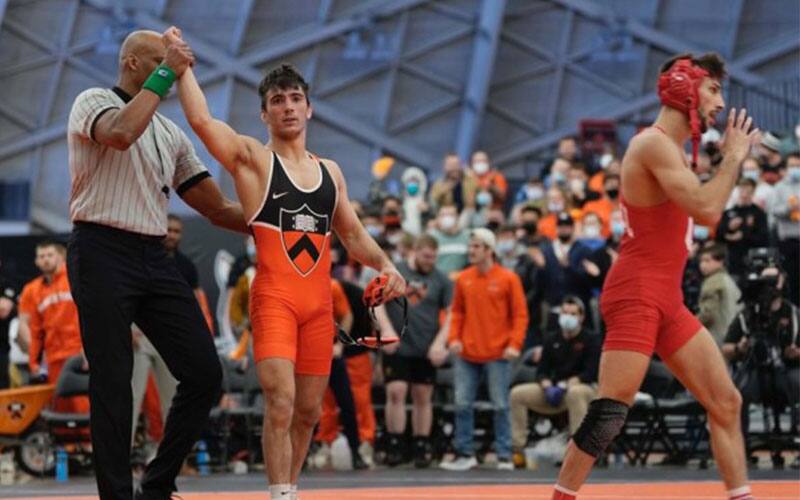 Pat Glory (Princeton) has his arm raised after win over Vito Arujau (Cornell)