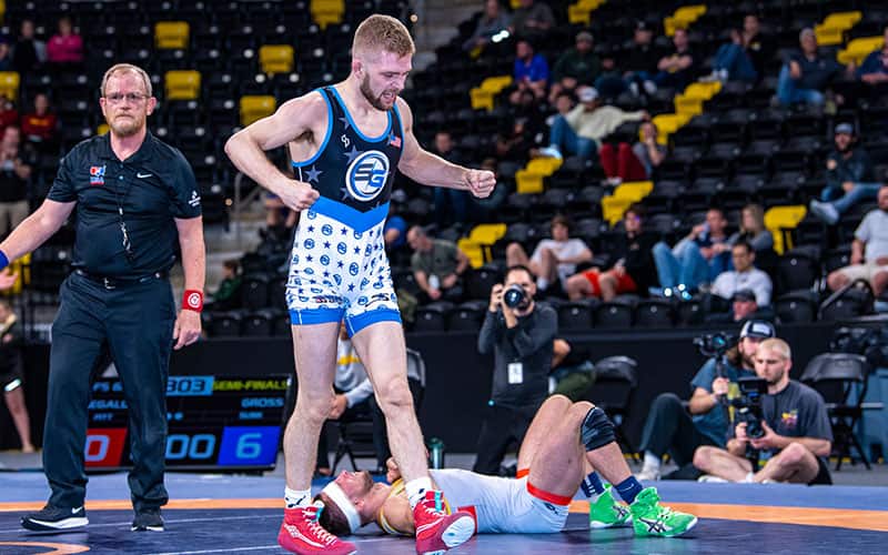 Seth Gross (Sunkist Kids) celebrates after beating Nico Megaludis (PittWC/TMWC) in the 61 kg semifinals.