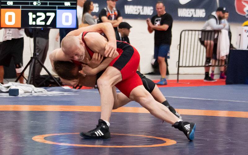 Peter Haag hits a headlock at 2022 Veterans Worlds