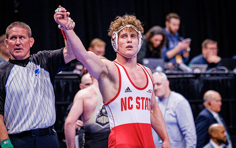 Trent Hidlay (NC State) with arm raised in victory at the 2022 NCAA Championships