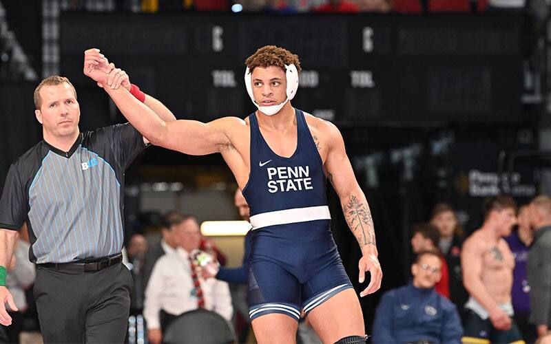 Greg Kerkvliet (Penn State) with arm raised