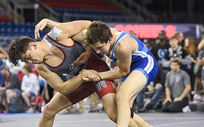 Q’veli Quintanilla of Washington controls the overhook and wrist 