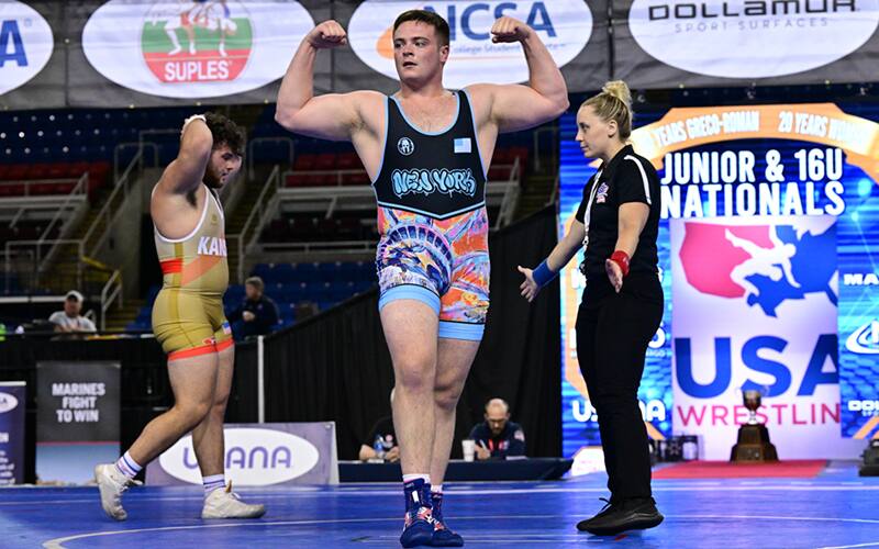 Ryan Stein of New York flexes after his semifinal bout win