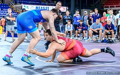 Aden Attao of Idaho ankle picks his opponent during the semifinals of Junior Men's Freestyle Nationals.