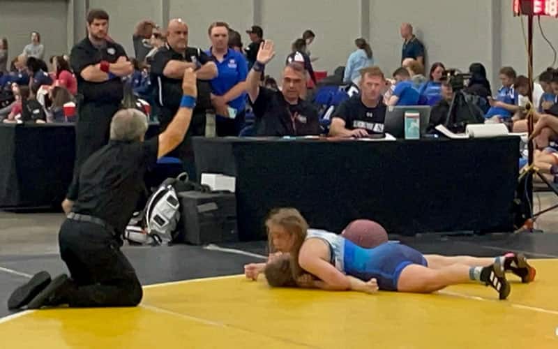 Aspen Barber (CO) scores a pin to give Colorado a win over Illinois and take the Pool D title at the Junior Women's National Duals.