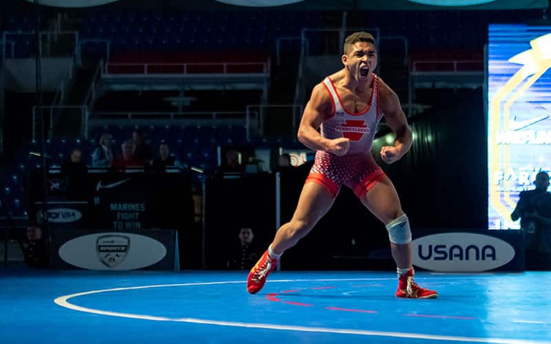 Mason Gibson of Pennsylvania flexes out after winning Junior Men's Freestyle Nationals