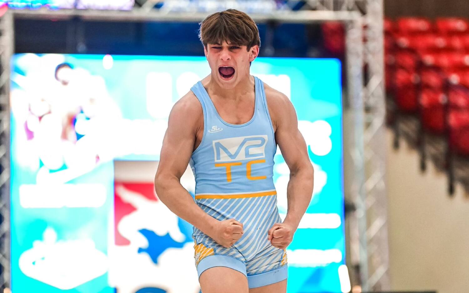 Tyler Kasak celebrates his winning match at the U17 Freestyle World Team Trials