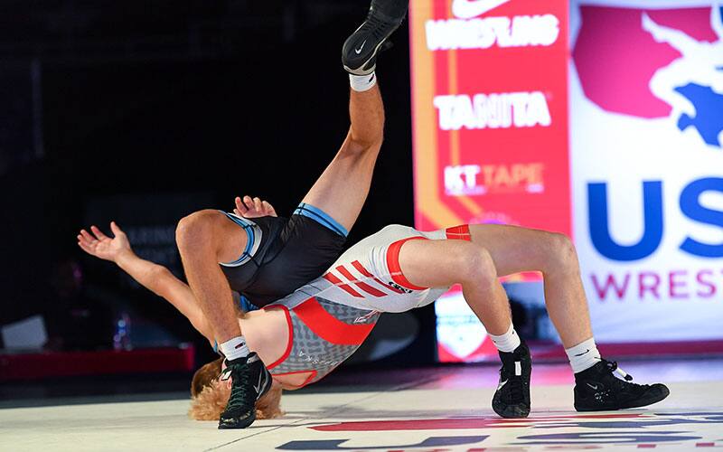 Kael Lauridsen (NE) throws opponent in 2021 16U Greco-Roman finals. 