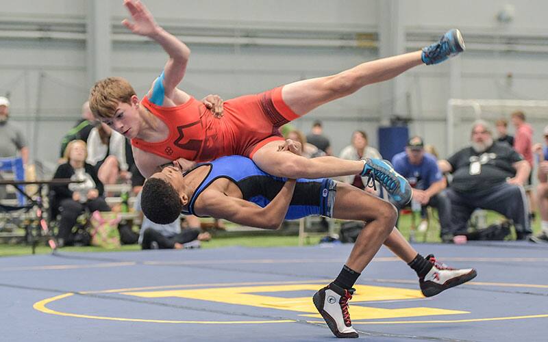 Caleb Noble (WI) launches an opponent at the 16U National Duals