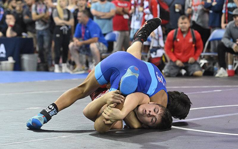 Jordyn Raney of Kentucky pins Bo Bassett of Pennsylvania in the round of 32.