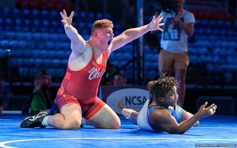 Aaron Ries of Ohio celebrating winning 16U men's freestyle nationals. 