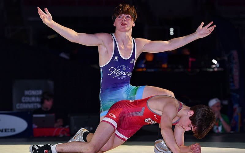 Hunter Taylor (MO) celebrates after winning the 2021 Junior Nationals freestyle title. 