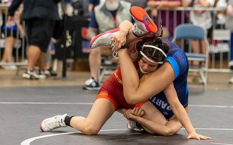 Julianna Ocampo (IN) secures a leg attack during the 2022 U15 Nationals