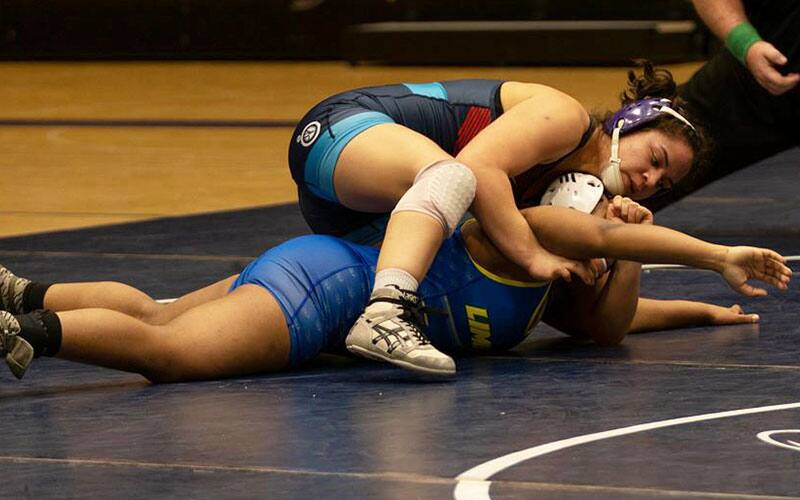 Ashlynn Ortega (King) works from the top on an opponent