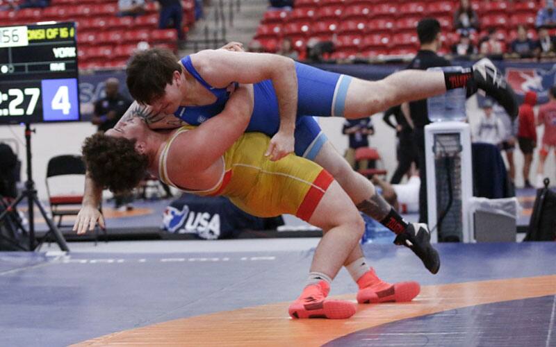 Cohlton Schultz (Sunkist Kids) throws opponent in 2022 U.S. Open
