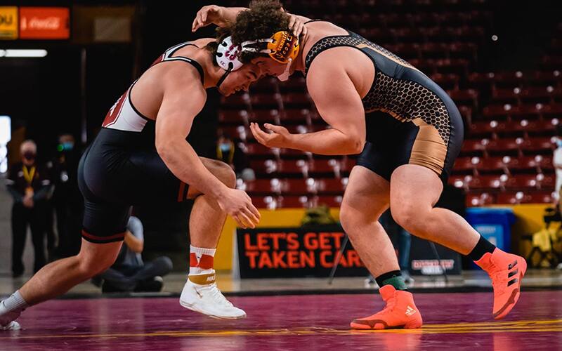 Arizona State's Cohlton Schultz wrestles against Stanford