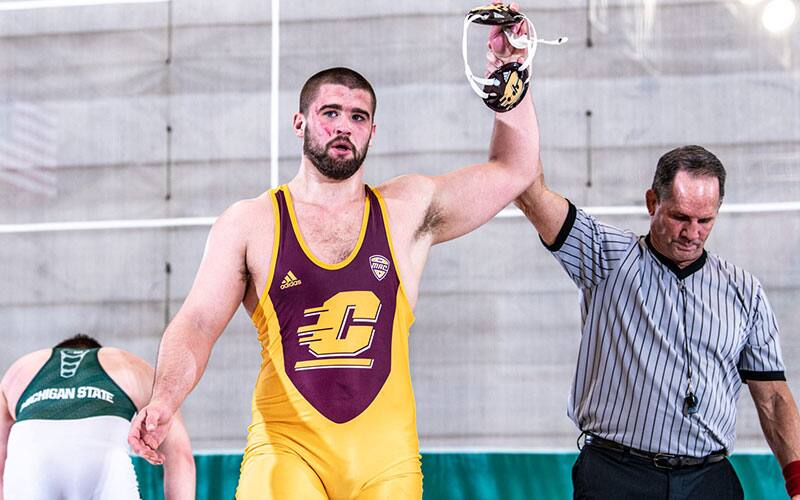 Matt Stencel (Central Michigan) with arm raised