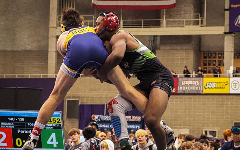 Aaron Stewart (IL) scored a takedown at the 2022 USA Wrestling Folkstyle Nationals