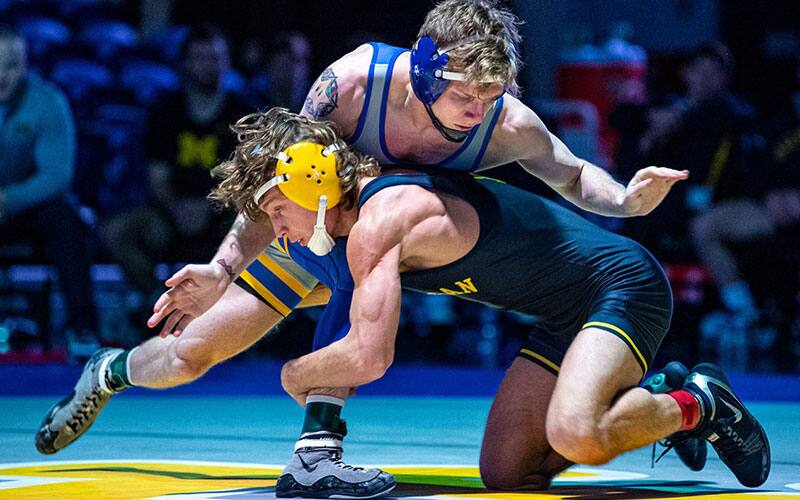 Nick Suriano (Michigan) on a leg attack in dual against Pitt